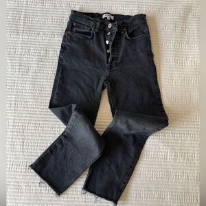 RE/DONE brand high-rise, straight-leg denim jeans faded black wash button fly